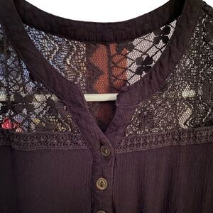BLACK sleeveless shirt with lace.